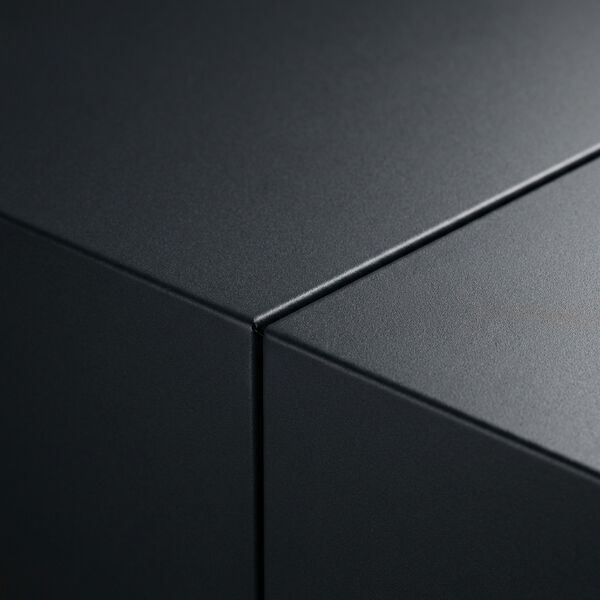 Bold contrast theme — wall detail showing dark panel and stainless reveal