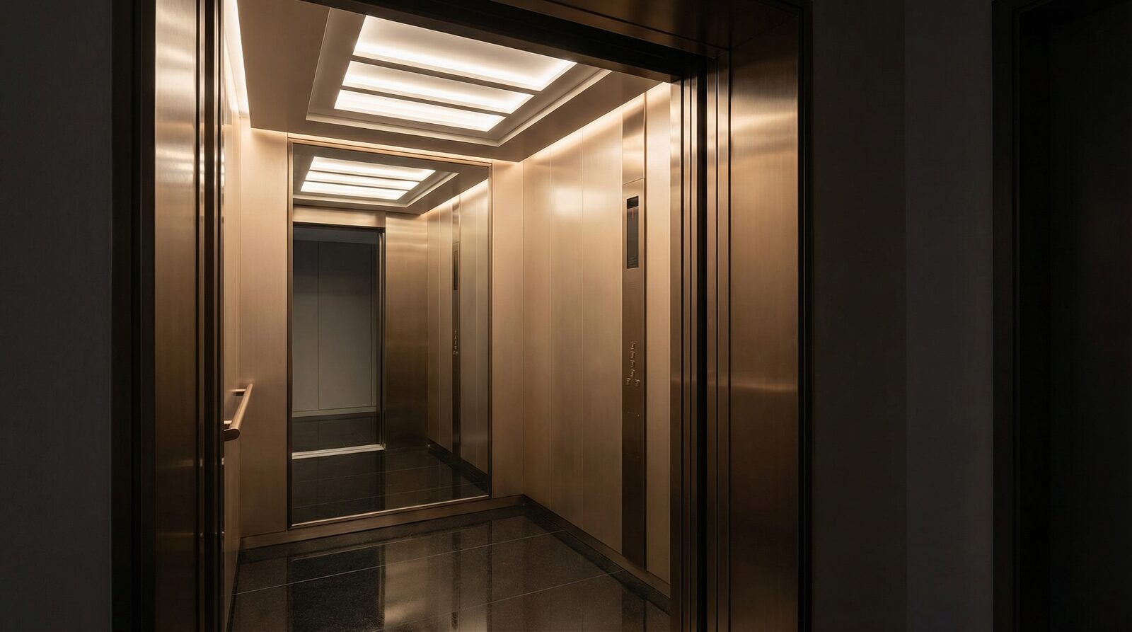 Boutique bronze cab interior theme — brushed bronze walls with warm-tone lighting and feature mirror