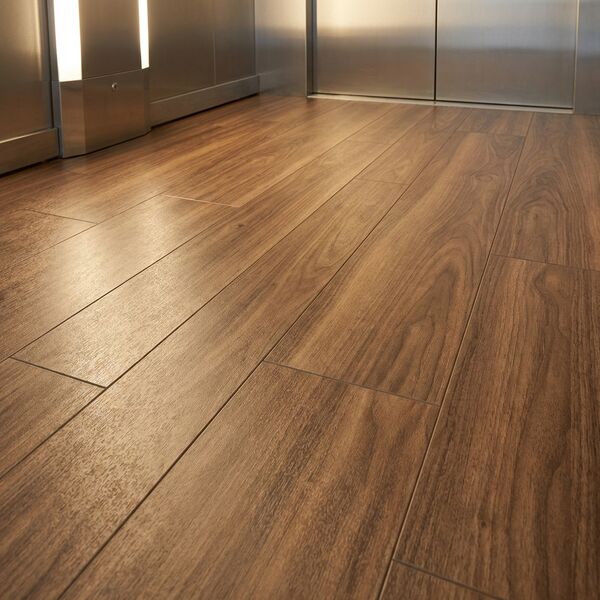 Warm heritage theme — porcelain floor detail with oak edge trim